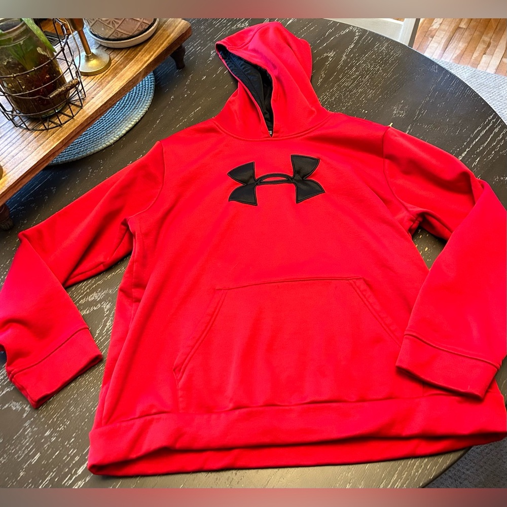 Nice Under Armour kids hoodie in a bright red with black.  Size XL.